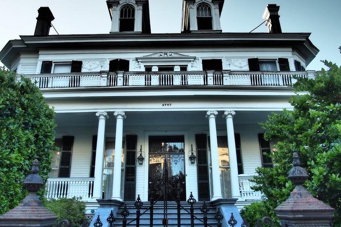 Garden District Home and History Walking Tour - Mansion stories beneath the oak trees