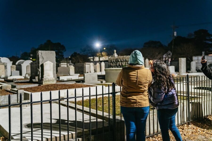New Orleans: Cemetery Bus Tour At Dark with Exclusive Access - What the guides add to the evening