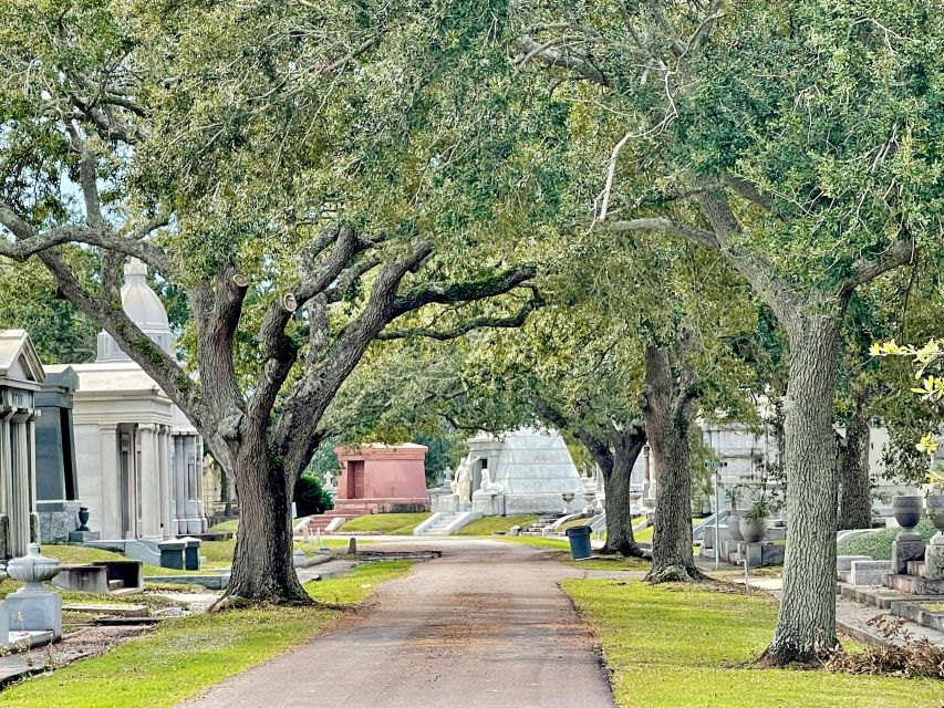 New Orleans: Millionaire’s Tombs of Metairie Cemetery Tour - Millionaire’s Row and the language of tombs