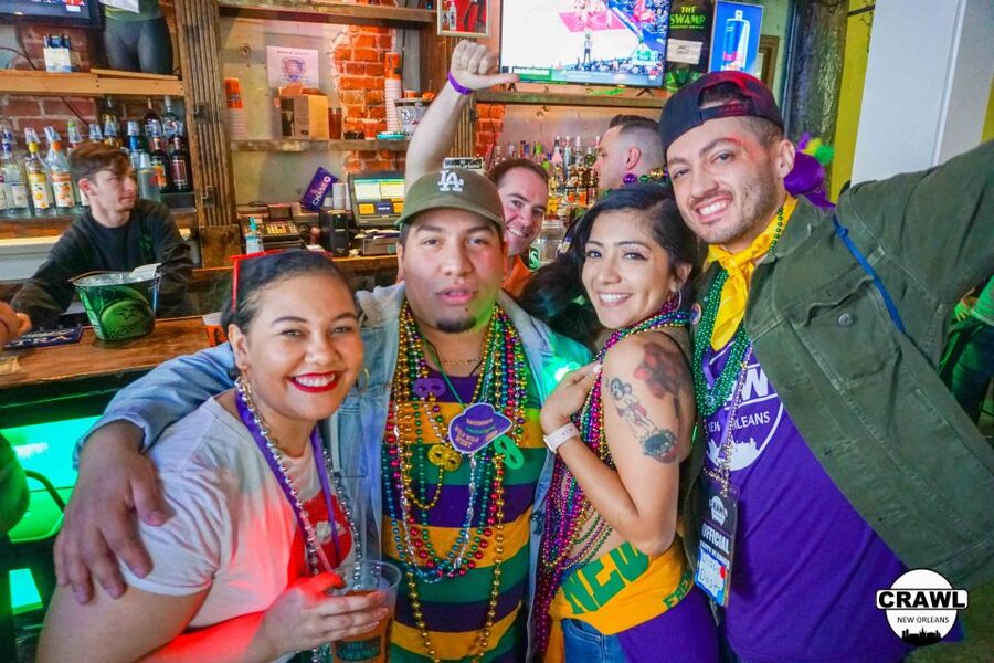 New Orleans: VIP Bar and Club Crawl Tour with Free Shots - Check-in at the large purple table