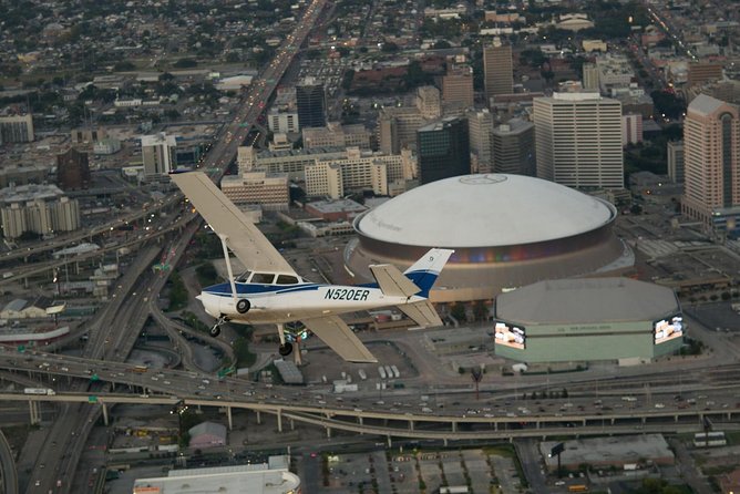 New Orleans VIP Sightseeing Flight with Champagne & Chocolates or Wine & Cheese - The Superdome, Smoothie King Center, and the modern city